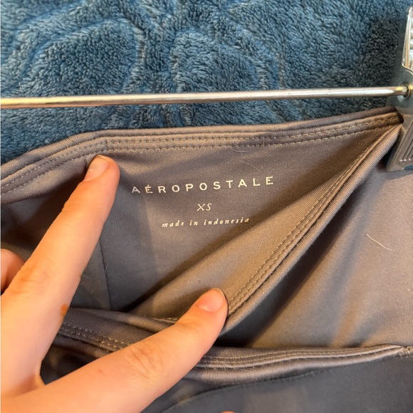 Grey crossover leggings - Picture 2 of 3